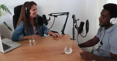 Hosts having podcast session together - Female speaker making an interview Stock Footage 161638176