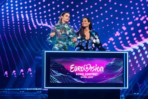 Hosts present the Qualifiers of the second semifinal at Eurovision Song Con.. Stock Photos