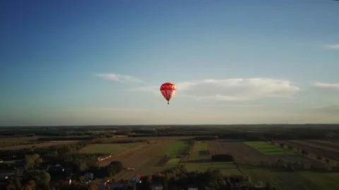 Hot air ballon On a beautiful cloudless sky Stock Footage 163029161