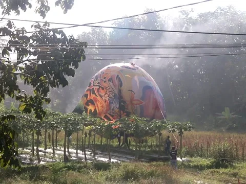 Hot Air Ballon Forced Down by Strong Wind After Flight Stock Footage 325633281