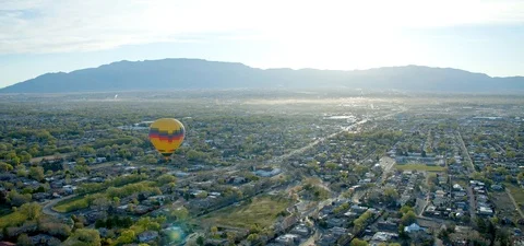Hot Air Balloon Above Albuquerque, New Mexico Desert by Aerial Drone Stock Footage 109491153