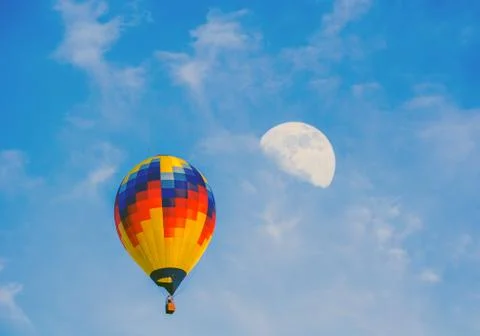 Hot air balloon and moon Stock Photos
