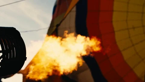 Hot air balloon. Fire bursts on sunset Stock Footage