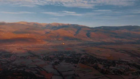 Hot air balloon floating over the picturesque Pyrenees of Spain Stock Footage 300388441