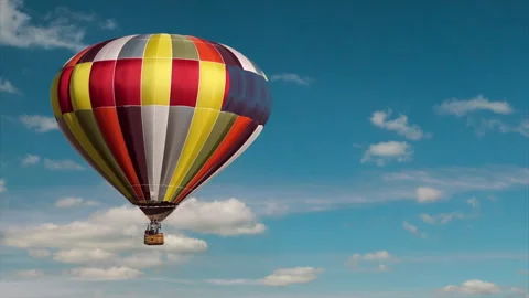 Hot air balloon flying high in sky, colorful airship, travel, flight, Stock Footage 164523202