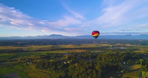 Hot Air Balloon Flying Over the Snohomish Valley. Stock Footage