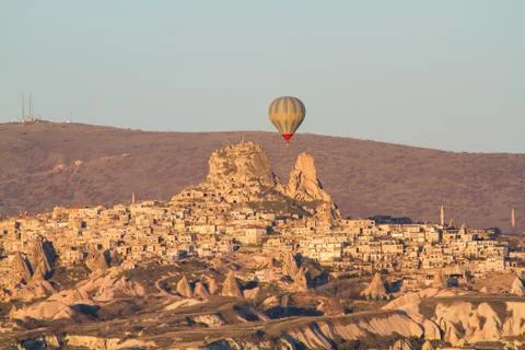 Hot air balloon flying over spectacular Cappadocia Stock Photos