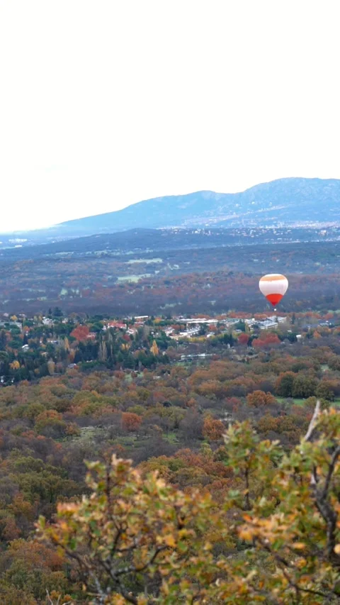 Hot air balloon flying at sunset Stock Footage 256165353