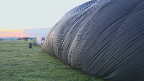 Hot Air Balloon Inflation Process in Slow Motion Stock Footage 218996919
