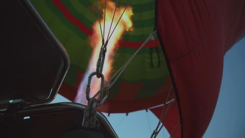 Hot Air Balloon As It Gets Filled With Gas Flame Video stock 100433739