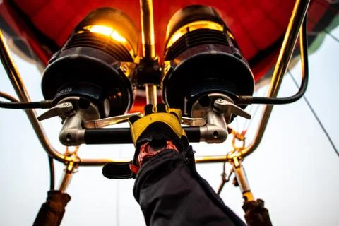 Hot Air Balloon Pilot Pulling Accelerator with Flame Stock Photos