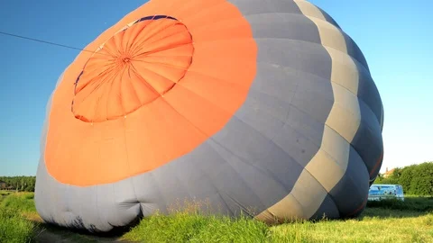 Hot air balloon preparing for flight, aerostation and aeronautics concept Stock Footage 91353154