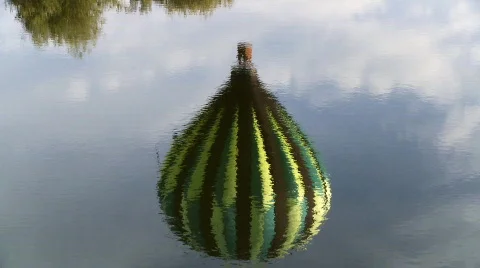 Hot Air Balloon Reflection in Water Stock Footage