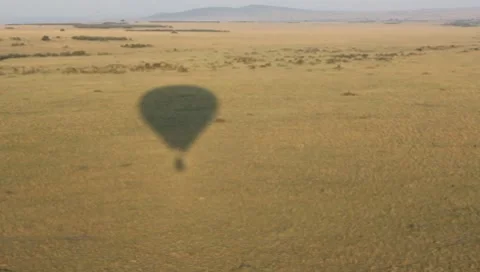 Hot Air Balloon Shadow over Masai Mara  (HD) Stock Footage 8572648