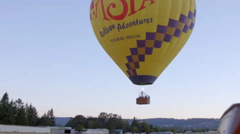 Hot air balloon slowing floats up Stock Footage 59169605
