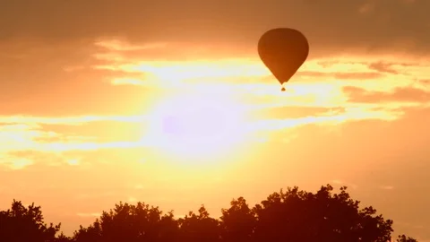 Hot air balloon with sunset Stock Footage 79016547