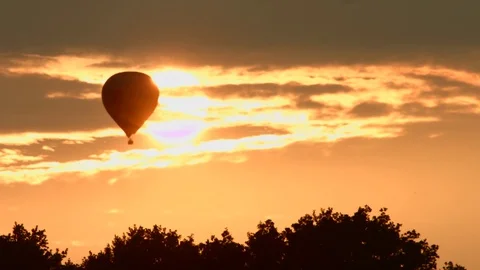 Hot air balloon with sunset Stock Footage 79016563