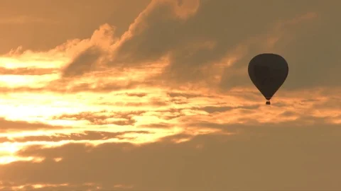 Hot air balloon with sunset Stock Footage 79016565