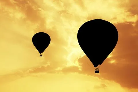 Hot air balloon at sunset Stock Illustration
