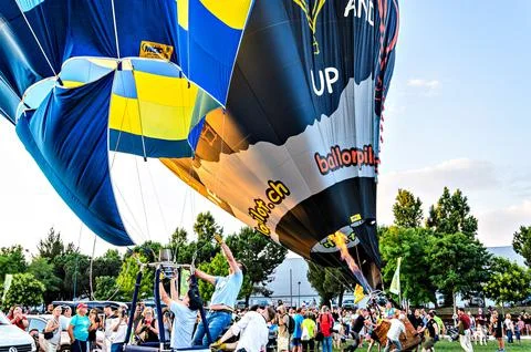 Hot air balloons are about to take off during European Balloon Festival in Igual Stock Photos