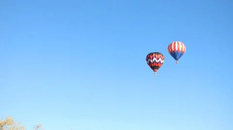 Hot Air Balloons Drift Into Upper RIght Video stock 37230157
