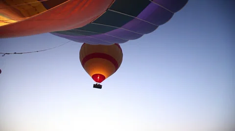 Hot air balloons in flight over Luxor at dawn, Egypt Stock Footage 38730892