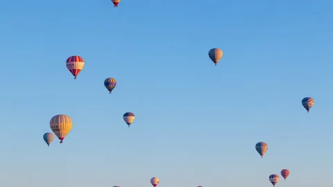 Hot air balloons flying over the valley at Cappadocia, Turkey. Video stock 201736701