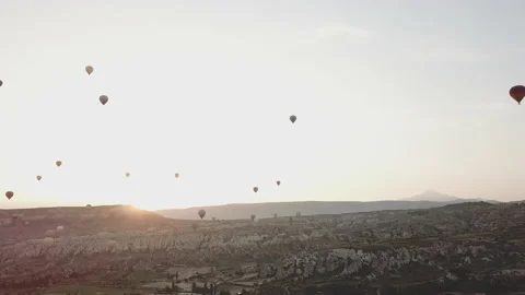 Hot air balloons hover over the valley Stock-Footage 149842512