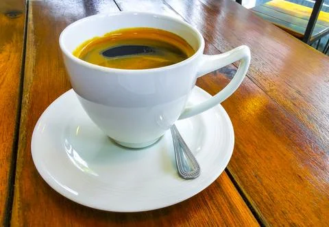 Hot Americano Coffee Cup On Rustic Wooden Table In Coffee Shop. Stock Photos