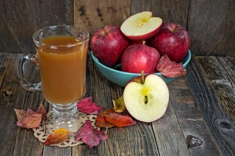 Hot apple cider with apples Stock Photos