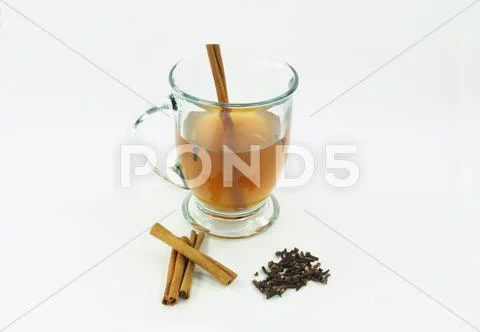 Hot apple cider in glass over white 03. Stock Photos