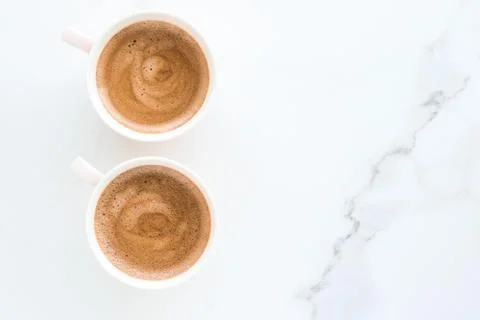 Hot aromatic coffee on marble, flatlay Stock Photos