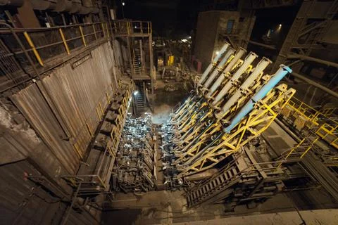 Hot billet bloom continuous casting, also called strand casting. Stock Photos