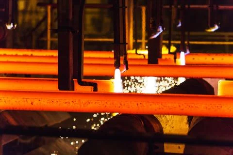 Hot billet bloom continuous casting, also called strand casting. Stock Photos