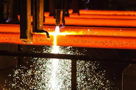 Hot billet bloom continuous casting, also called strand casting. Stock Photos