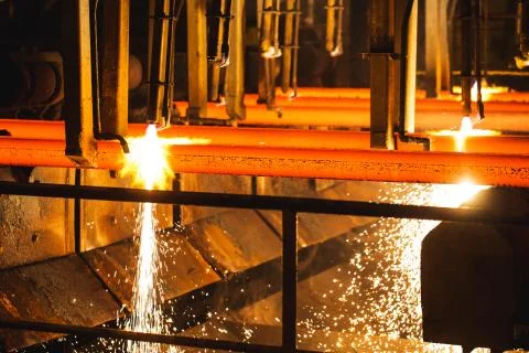 Hot billet bloom continuous casting, also called strand casting. Stock Photos