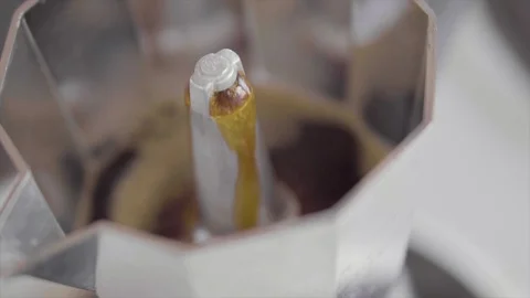 Hot black coffee in slow motion coffee percolator and steam Stock Footage 108346579