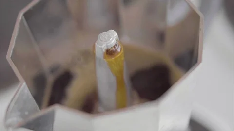 Hot black coffee in slow motion a coffee percolator with steam and hot coffee Stock Footage 108346758