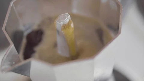 Hot black coffee in slow motion exploding coffee percolator steam hot coffee Stock Footage 108347310