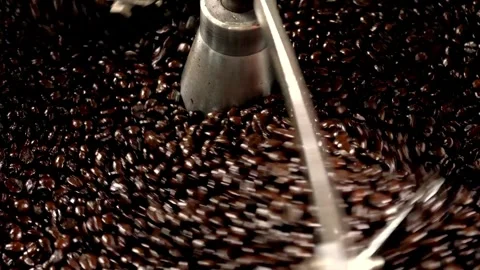 Hot black roasted coffee bean in machine cooling roastery machine industria.. Stock Footage 272457371