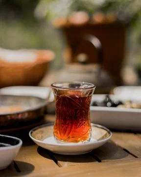 Hot black tea in armudu glass Stock Photos