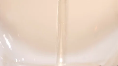 Hot black tea is poured, throw pieces sugars. Close ups Stock Footage 73766961