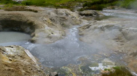 Hot boiling mud at fumarole in volcanic area in Kamchatka Stock Footage 66529257