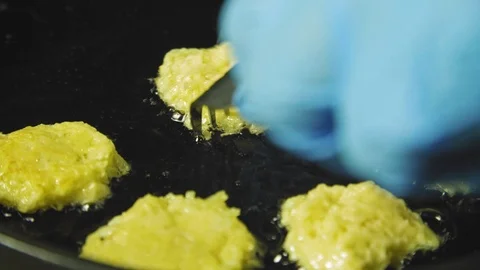 Hot boiling oil in deep fried close-up. The cook fries the food in the deep Stock Footage 99842494