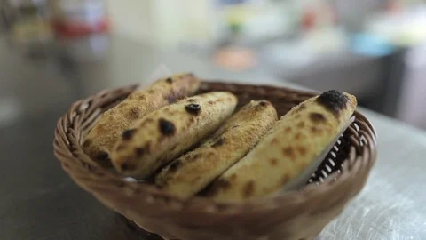 Hot bread in basket waiting to be served Stock Footage 102519159