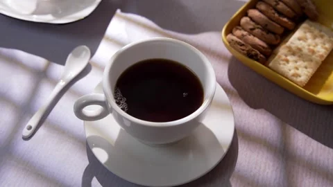 Hot Brewed Coffee Flowing Into A Cup for A Cozy Morning Ritual Stock Footage 324552419