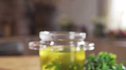 Hot broth is mixed in a saucepan, boiling onion soup, making of the first dish Stock Footage 79042295