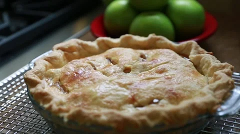 Hot bubbling apple pie from the oven Stock Footage 43394916