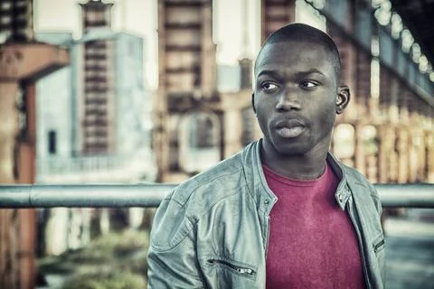 Hot buff black man posing Portrait of a sexy young black man in urban envi... Stock Photos