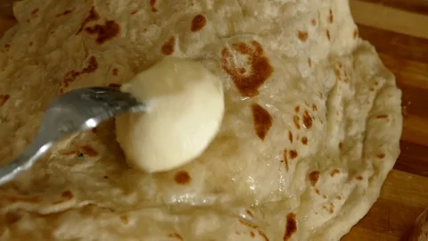 Hot bun and spring rolls with butter, hot bread and butter, Stock Footage 104618963